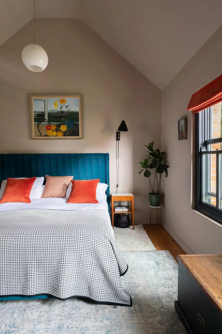 Contemporary Open-Plan Living Spaces in an English Victorian House 21 bedroom blue velvet bedframe
