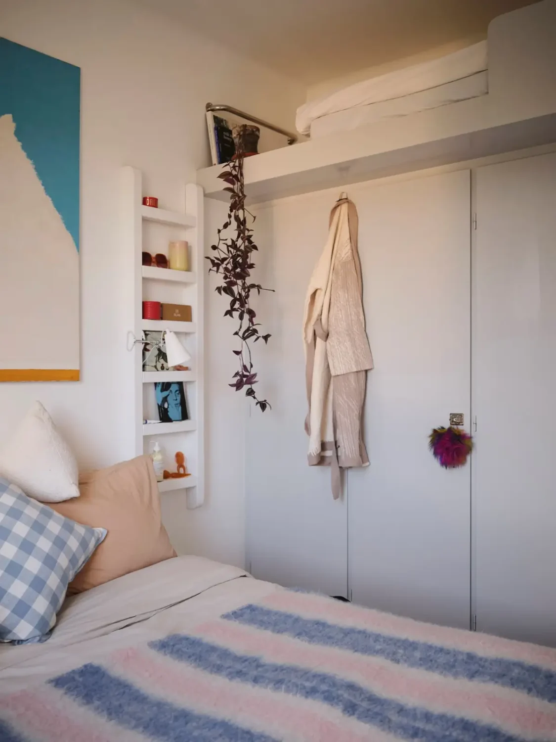 A Pink Bathroom and a Plywood Kitchen in a Stockholm Apartment 18 bedroom built-in wardrobes loft area