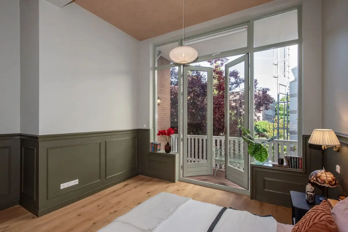 Art Nouveau Elegance Meets Modern Living in a Pink & Green Apartment 17 bedroom glass balcony doors
