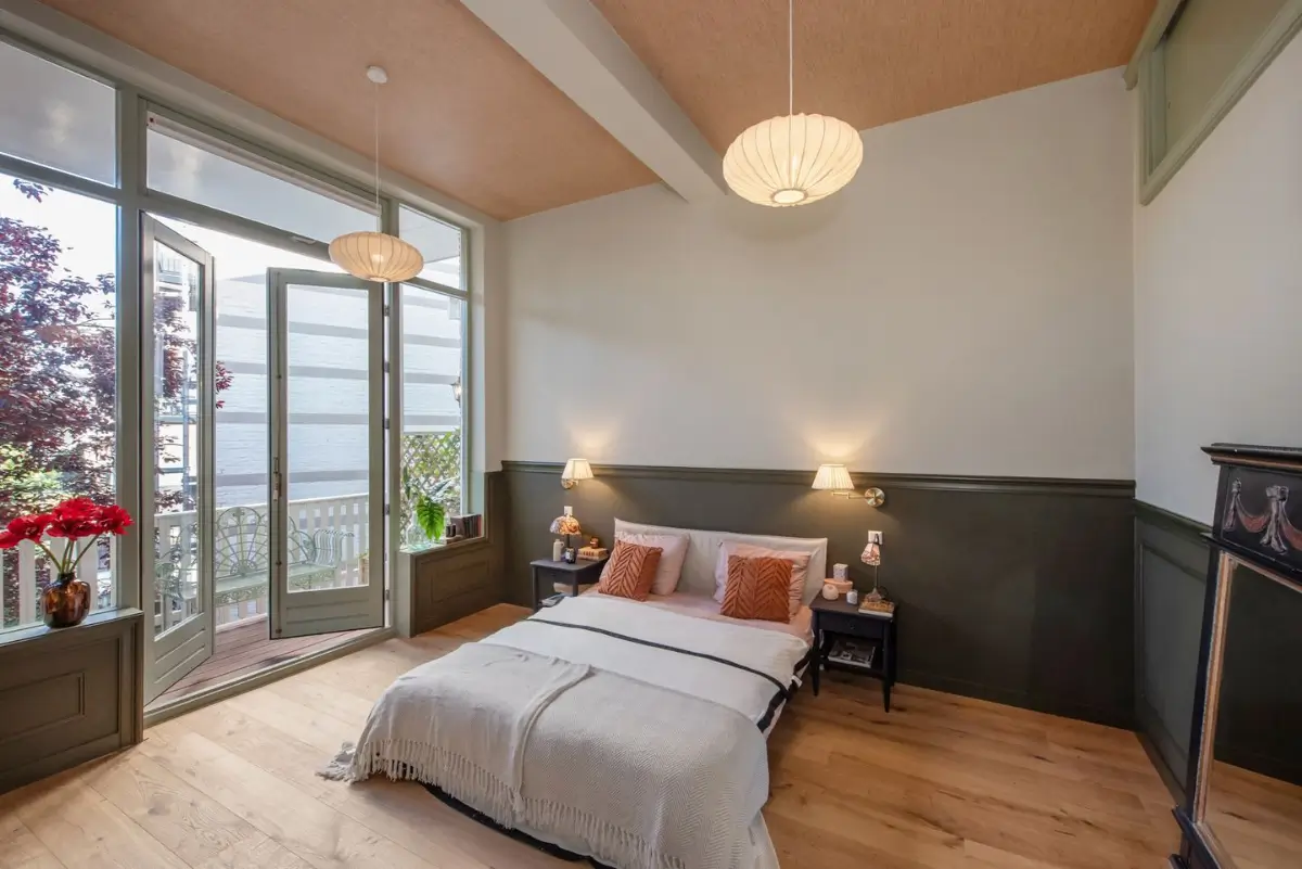 Art Nouveau Elegance Meets Modern Living in a Pink & Green Apartment 16 bedroom green paneling balcon