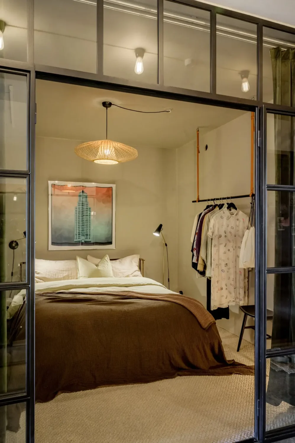 A Modern Swedish Apartment with Half-Painted Pink Walls 16 bedroom hanging wardrobe industrial wall