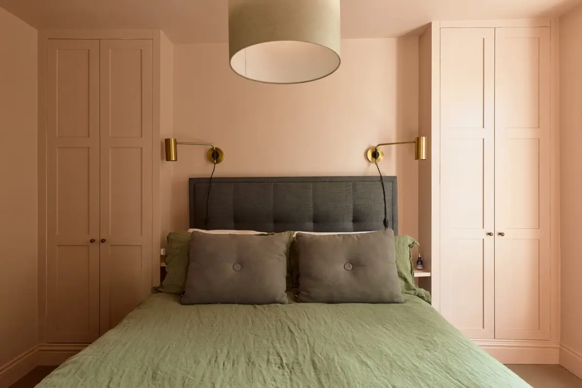 A Classic Victorian Duplex with a Lush, Private Garden in London 20 bedroom pink walls built-in wardrobes
