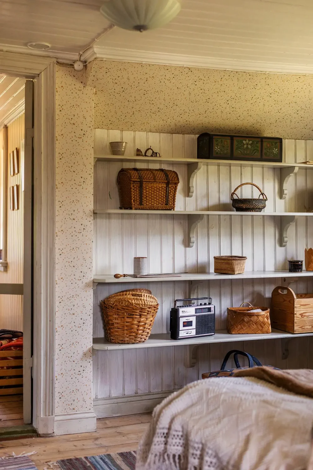 A Historic Lakeside Summer House in the Stockholm Archipelago 19 bedroom shelves paneling