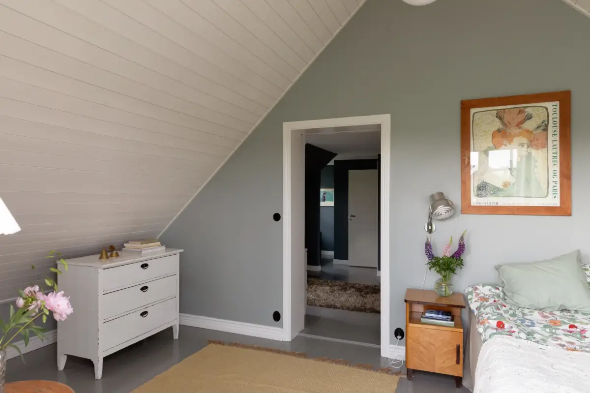 A Renovated 1920s Villa with a Spectacular Garden 28 bedroom slanted wooden ceiling