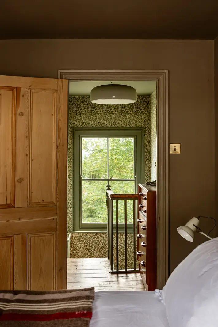 A Muted Color Palette and Original Details in a Victorian Terrace House 17 bedroom view onto landing