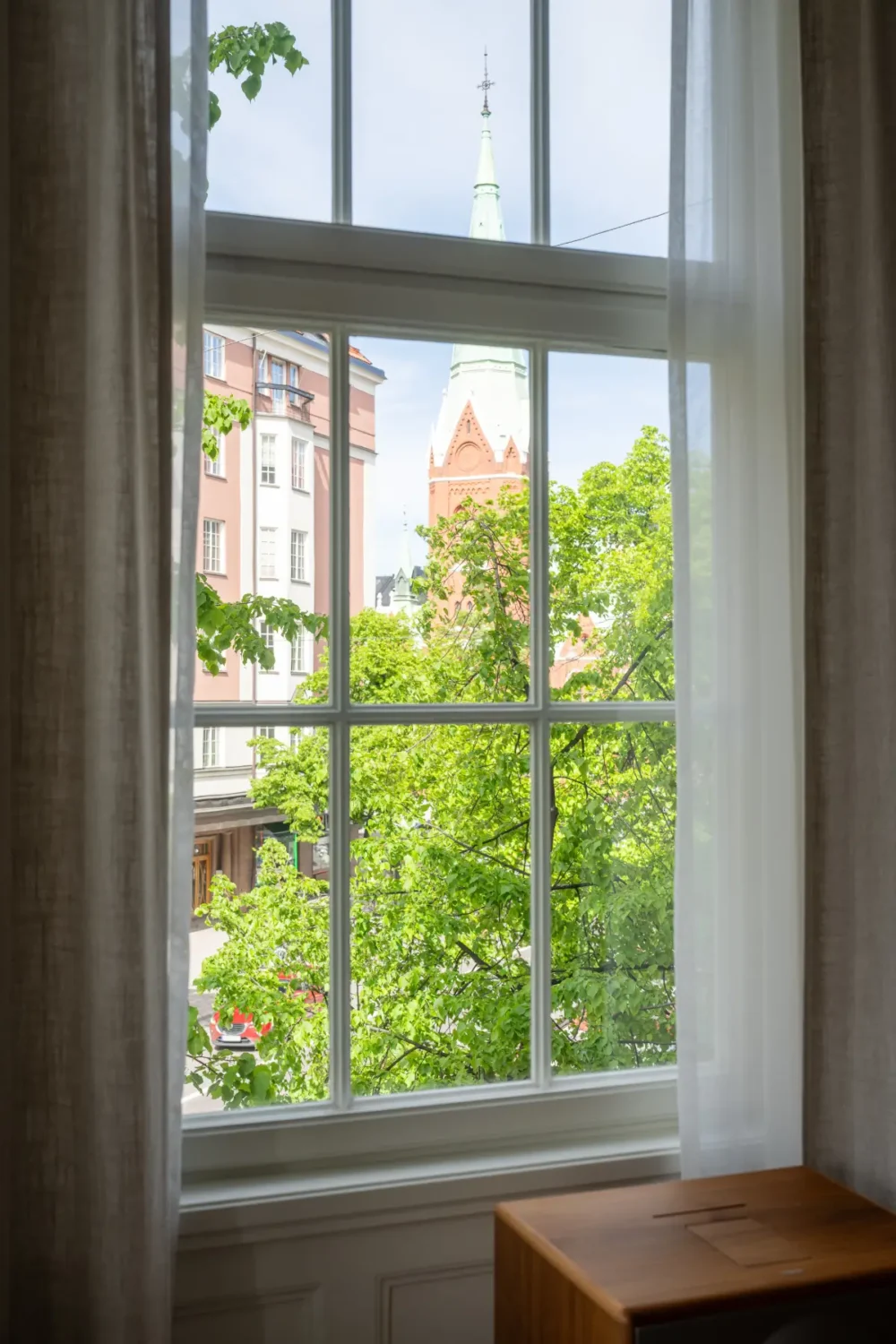 A Classic Stockholm Apartment with a Sky-Blue Kitchen 10 bedroom window view