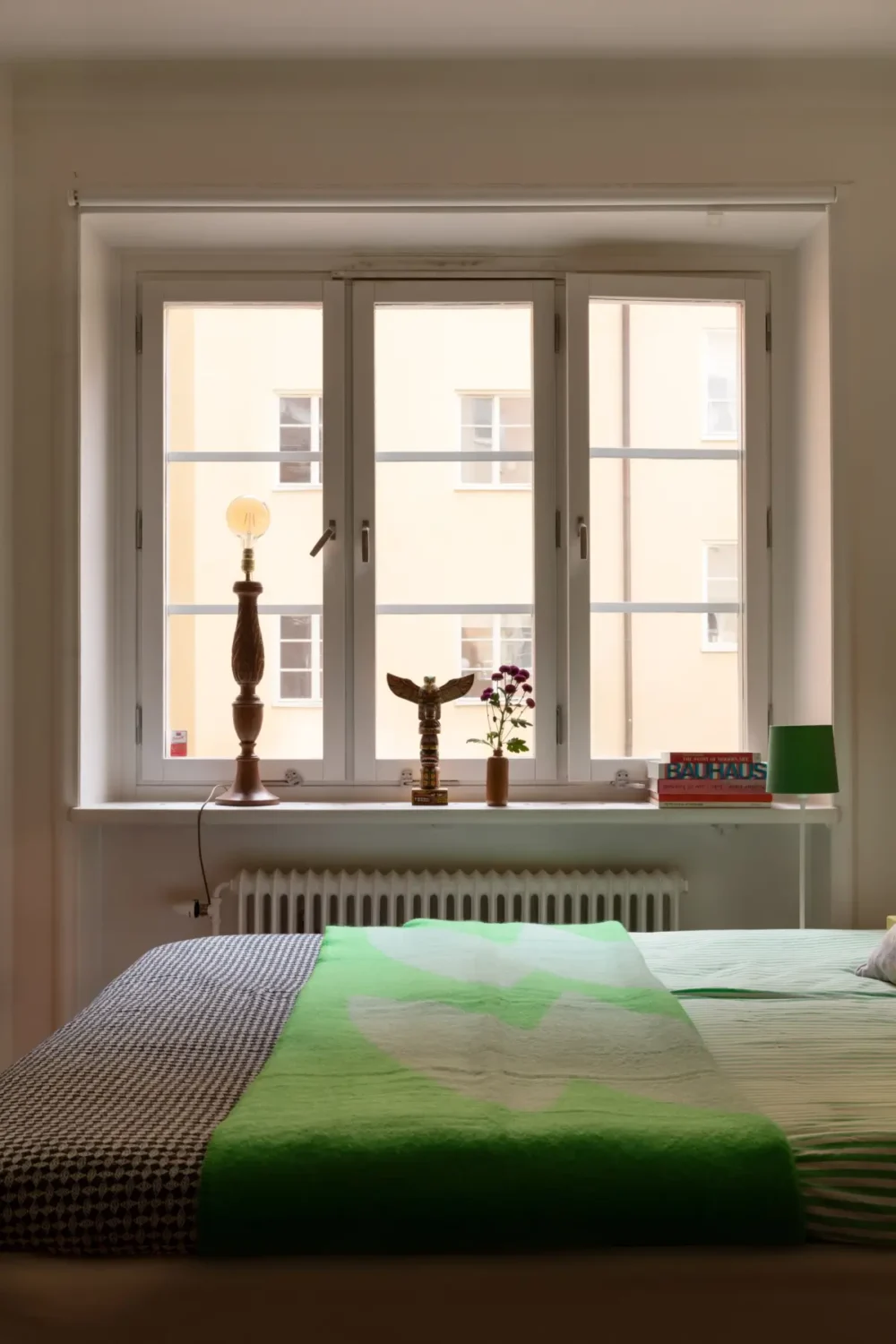 A Cozy 1920s Apartment Filled with Books, Art, and Music 19 bedroom windows