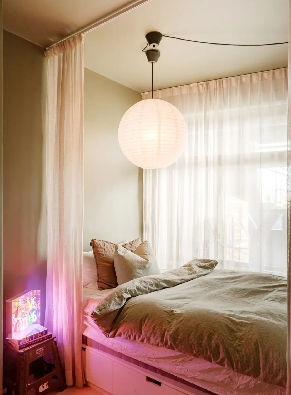 A Modern Swedish Apartment with Half-Painted Pink Walls 20 bedroom with storage bed A Modern Swedish Apartment with Half-Painted Pink Walls