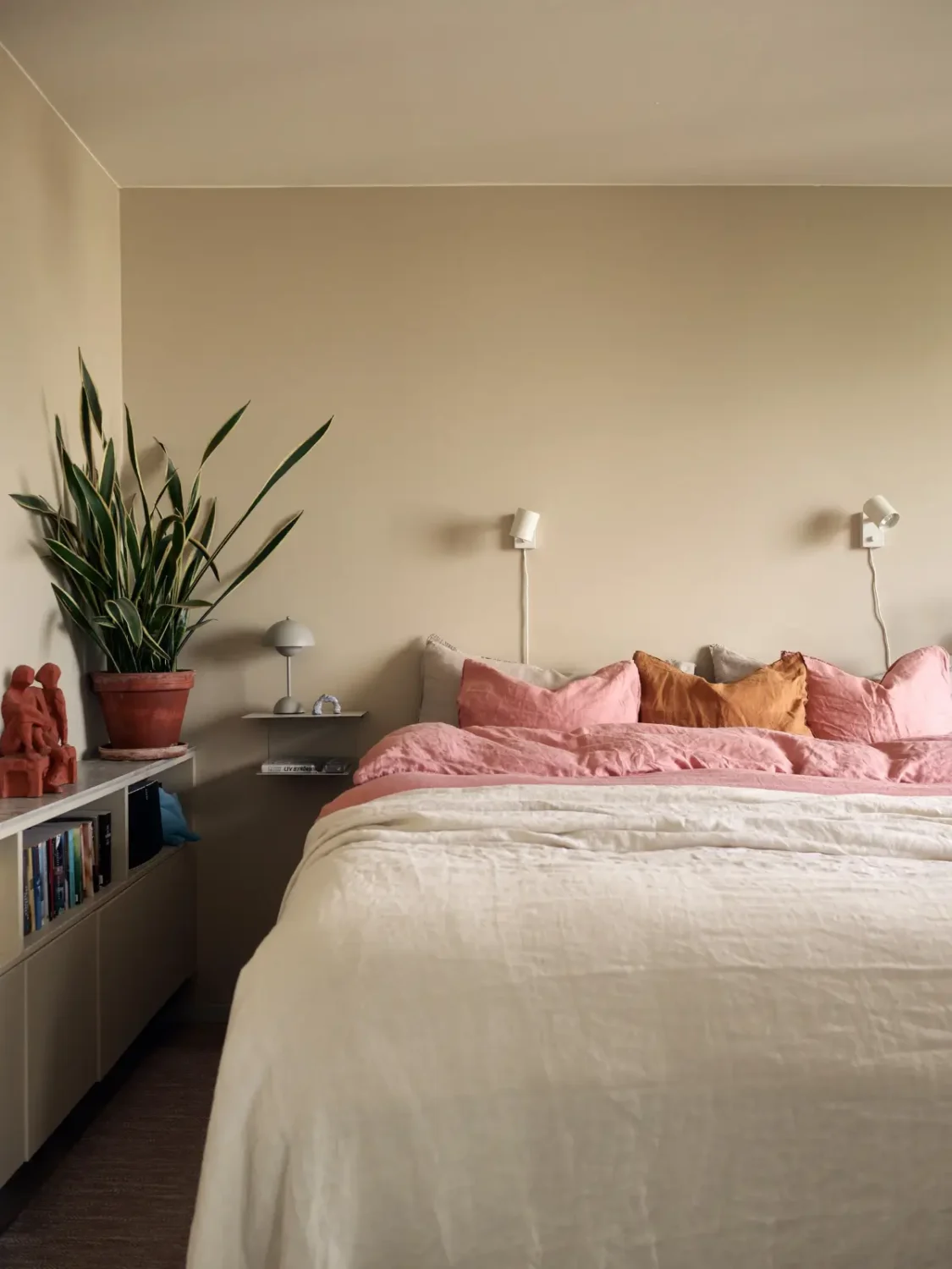 Industrial Elements in a 1960s Duplex Apartment in Stockholm 36 beige scandi bedroom