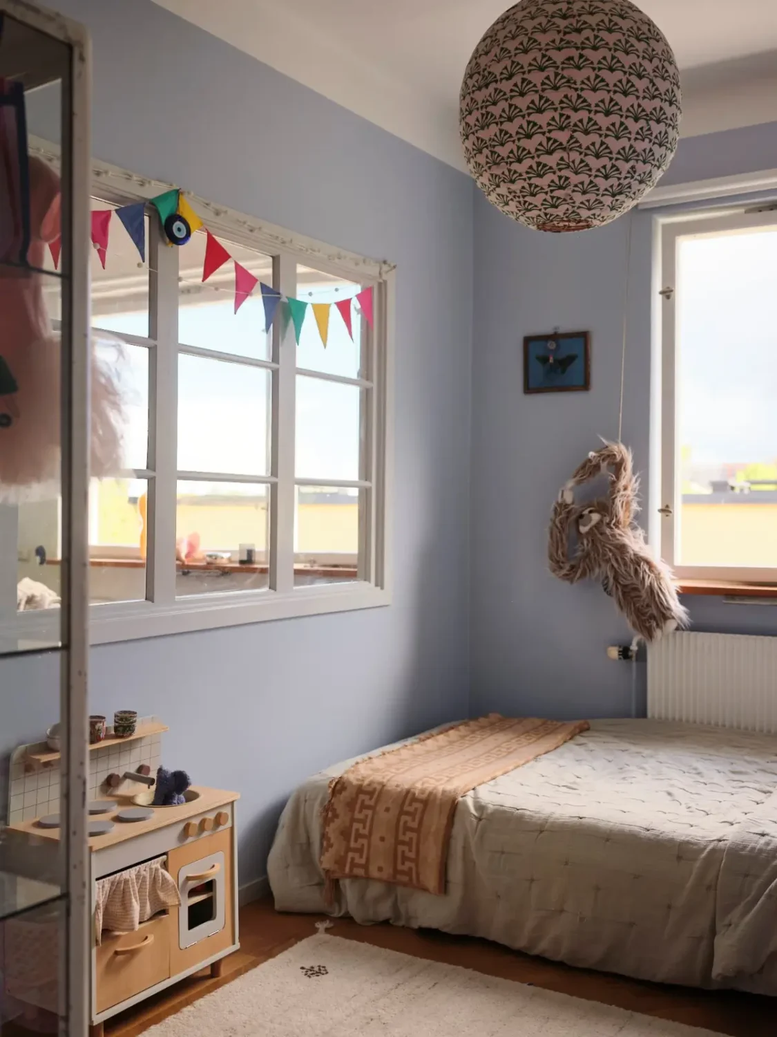 A Pink Bathroom and a Plywood Kitchen in a Stockholm Apartment 20 blue childrens room