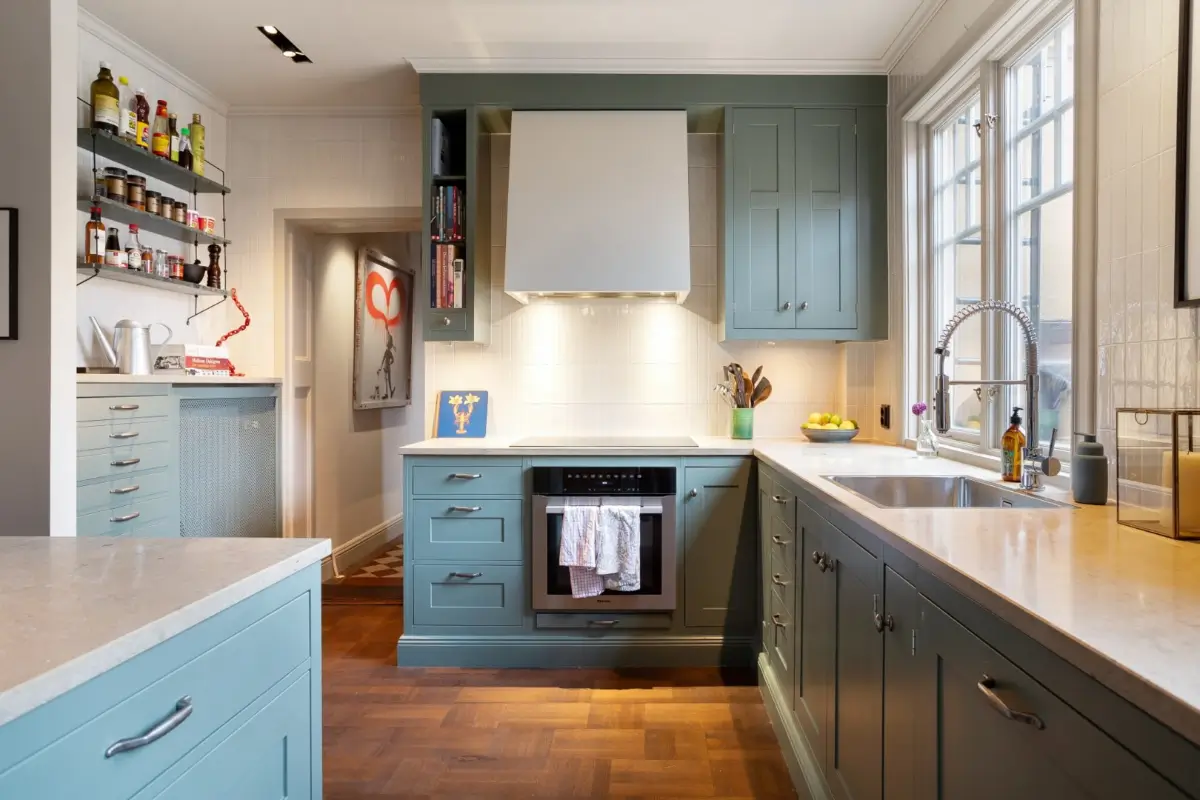 blue kitchen white backsplash tiles
