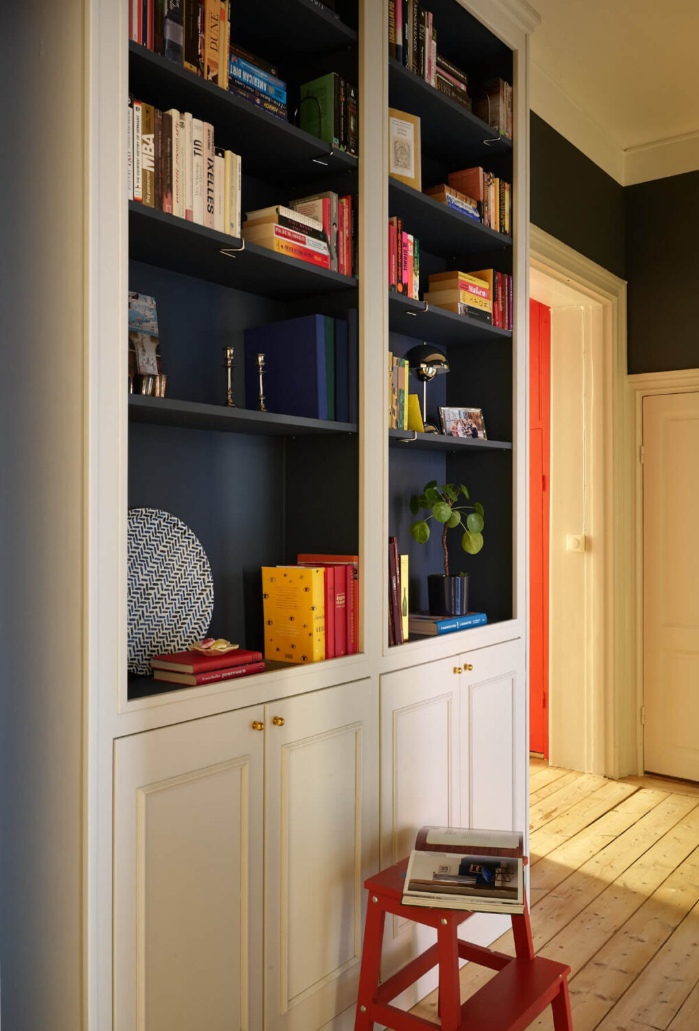 Blue and Red Color Accents in a Stylish Scandinavian Apartment 22 built-in cabinets with blue interiors