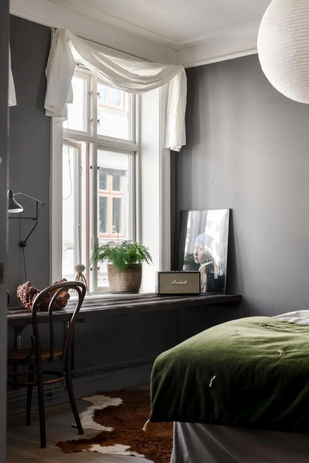 A Dark Gray Swedish Apartment with an Olive Green Kitchen 20 built-in desk