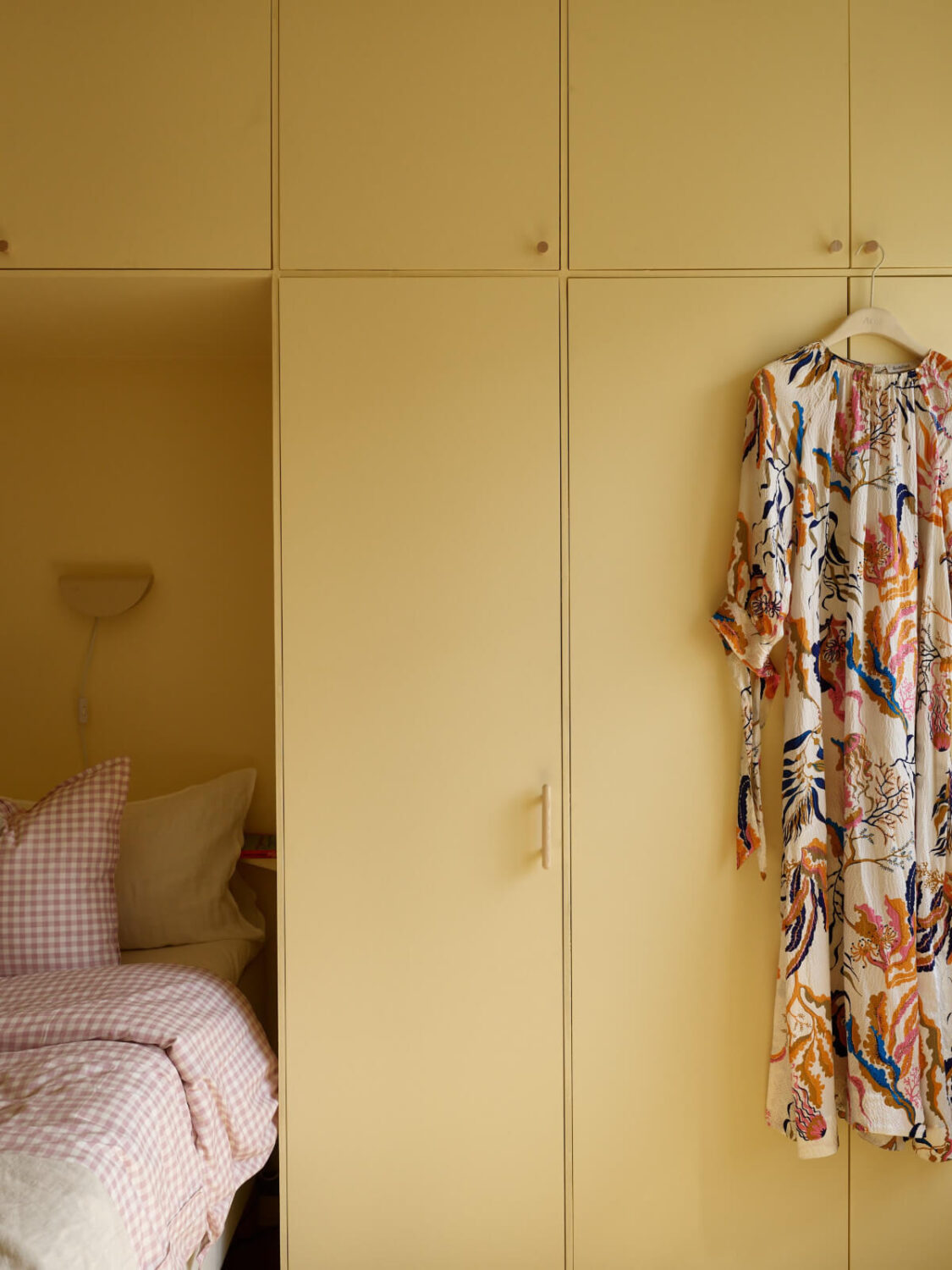 A Stockholm Apartment with a Butter-Yellow Bedroom 15 butter yellow bedroom wardrobes