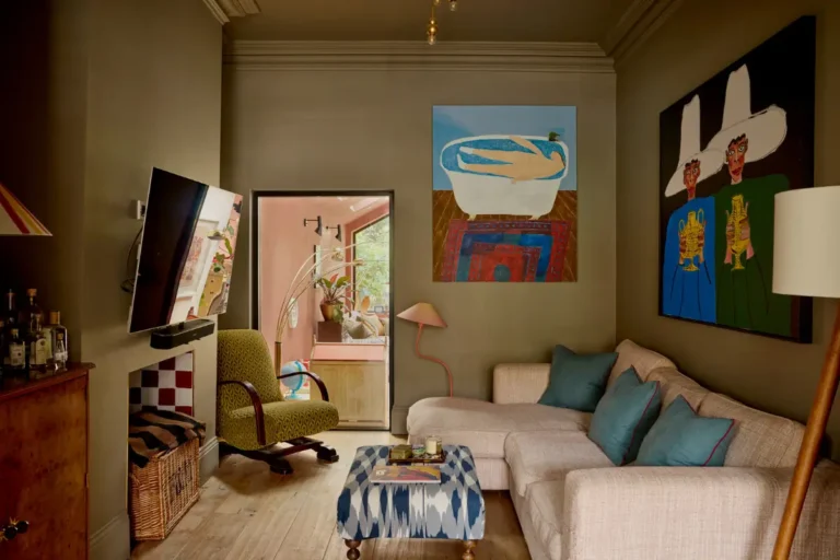 color drenched green sitting room