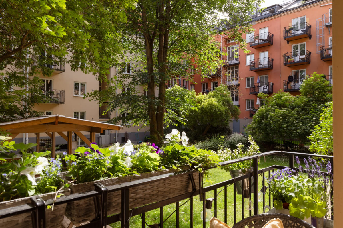 A 1930s Stockholm Apartment With Views of a Lush Garden 5 courtyard balcony view