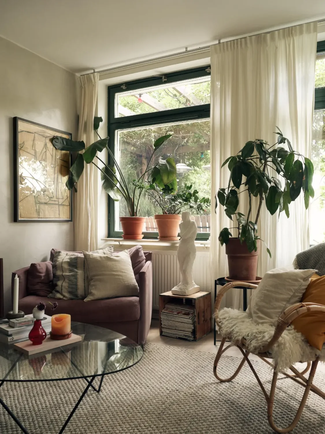 Industrial Elements in a 1960s Duplex Apartment in Stockholm 4 cozy living room purple armchair
