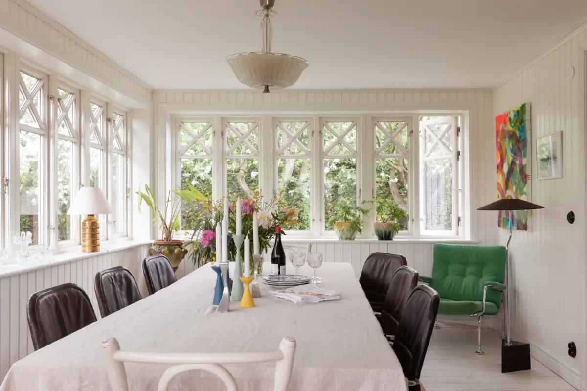 A Renovated 1920s Villa with a Spectacular Garden 17 dining room tongue and groove paneling