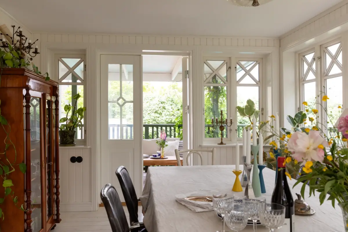 A Renovated 1920s Villa with a Spectacular Garden 18 dining room veranda