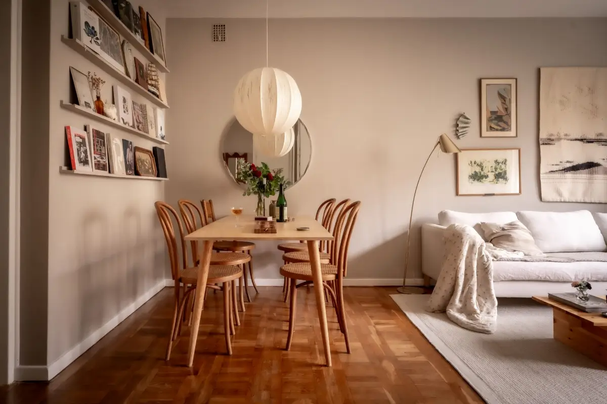 An Earthy Color Palette and Exposed Brick in a 1940s Apartment 9 dining table round mirror