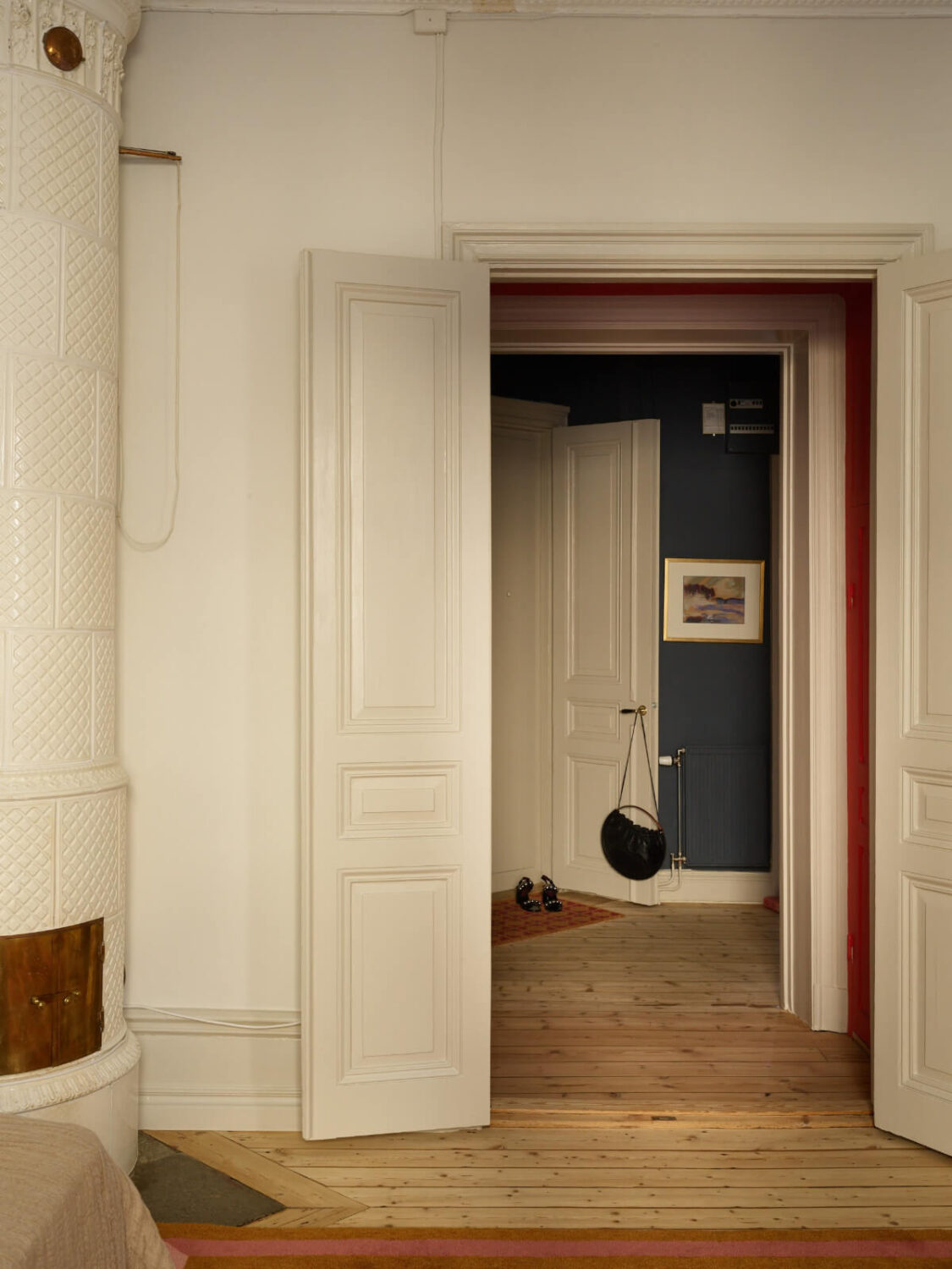 Blue and Red Color Accents in a Stylish Scandinavian Apartment 19 double doors