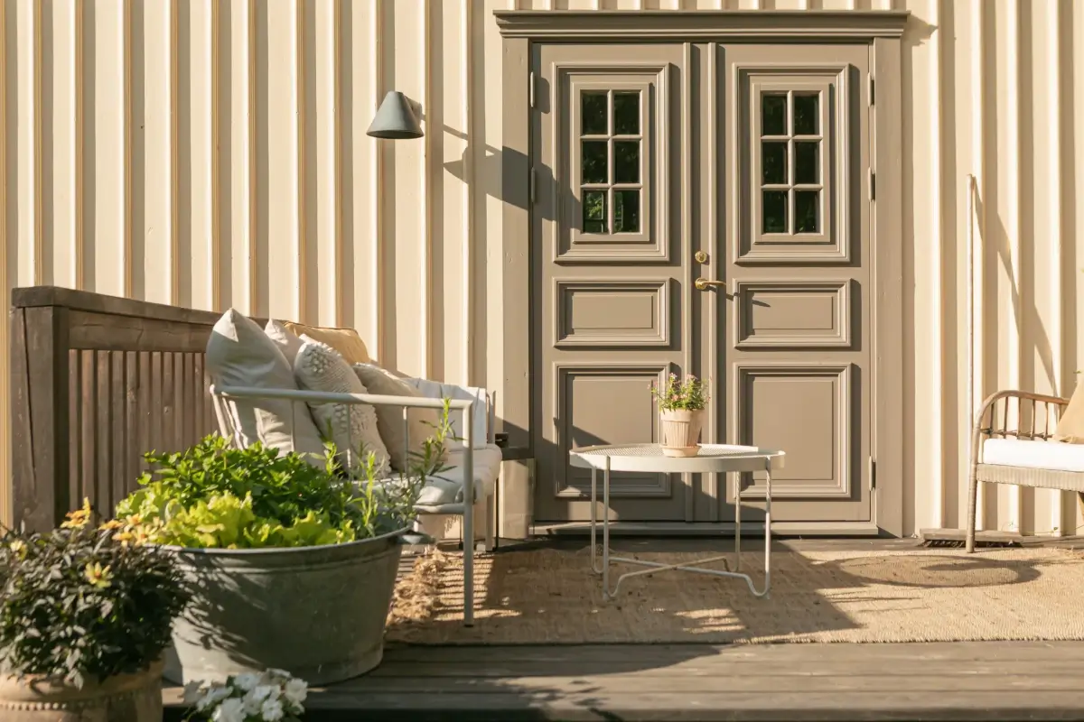 Modern Comforts and Historic Architecture in an 18th Century Home 2 double doors and wooden terrace