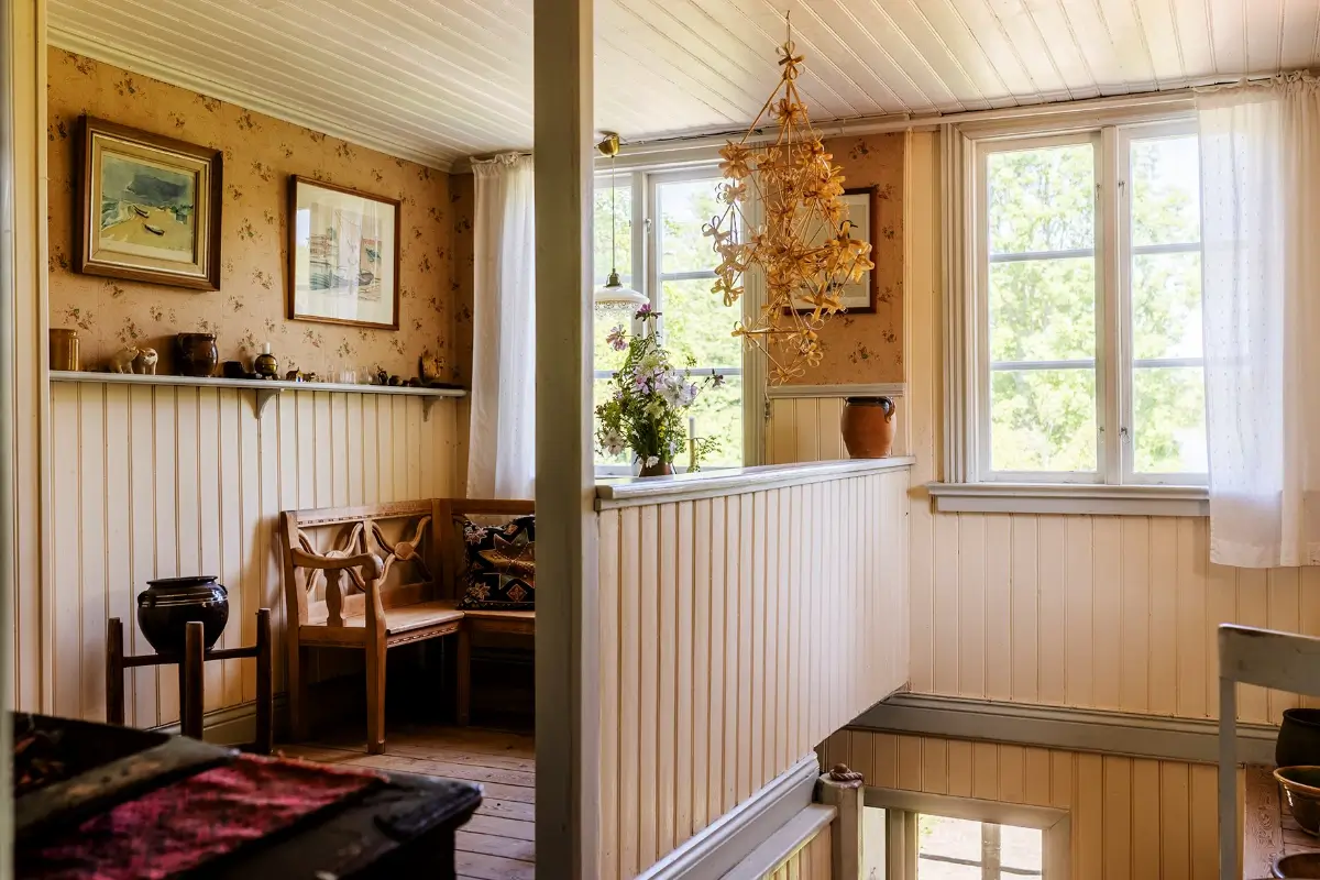 A Historic Lakeside Summer House in the Stockholm Archipelago 15 first floor landing paneling floral wallpaper