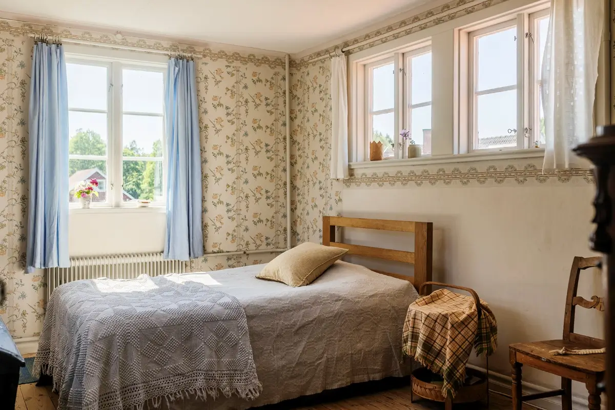 A Historic Lakeside Summer House in the Stockholm Archipelago 20 floral wallpaper bedroom