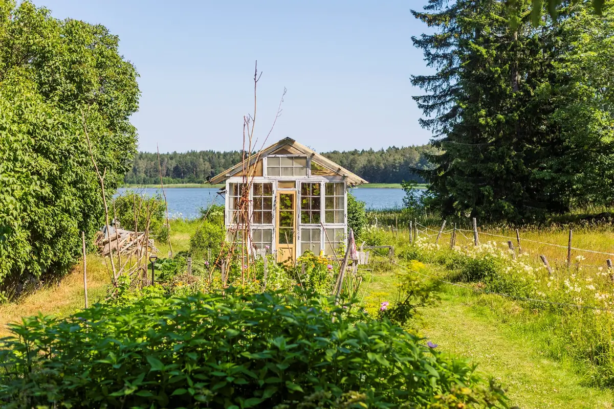 A Historic Lakeside Summer House in the Stockholm Archipelago 29 garden-glass-house