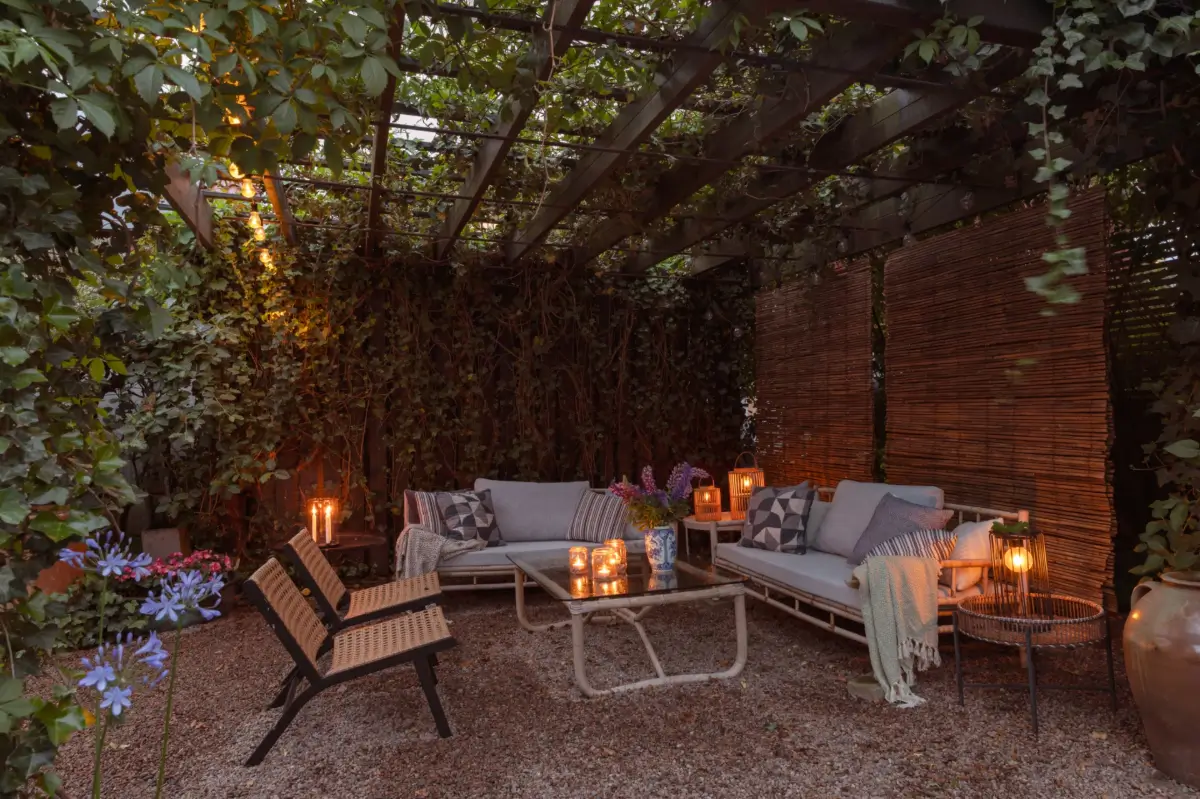 A Renovated 1920s Villa with a Spectacular Garden 45 garden seating area pergola at night