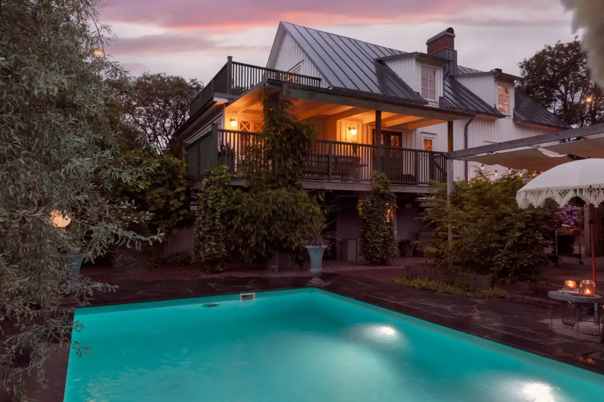 A Renovated 1920s Villa with a Spectacular Garden 2 garden veranda at night