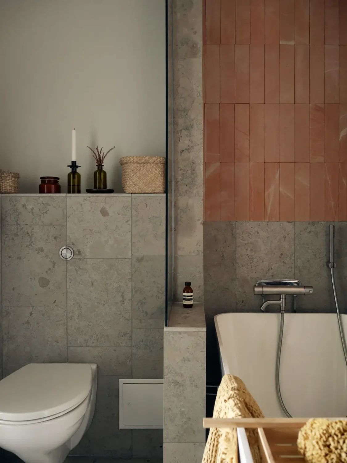 Industrial Elements in a 1960s Duplex Apartment in Stockholm 42 gray and pink bathroom