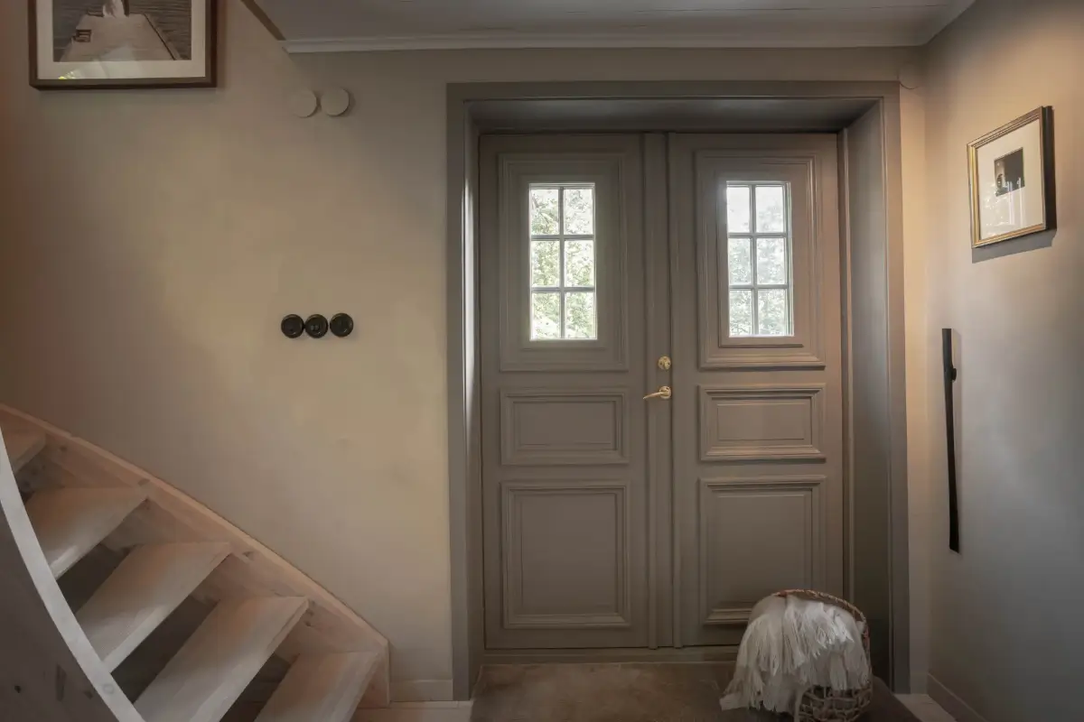 Modern Comforts and Historic Architecture in an 18th Century Home 21 gray front door