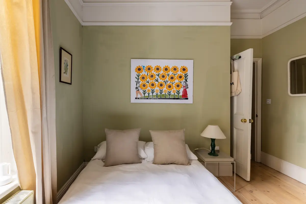 A Modern Extension and Period Details in a Ground Floor London Home 16 green bedroom