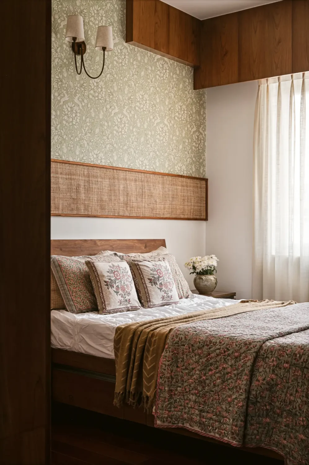 A South Indian Family Home Where Heritage Meets Bold Color Choices 16 green floral wallpaper bedroom