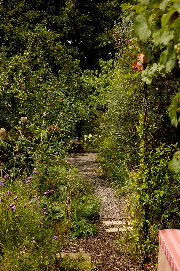 A Victorian Home with a Rich Color Palette and a Lush Garden 26 c