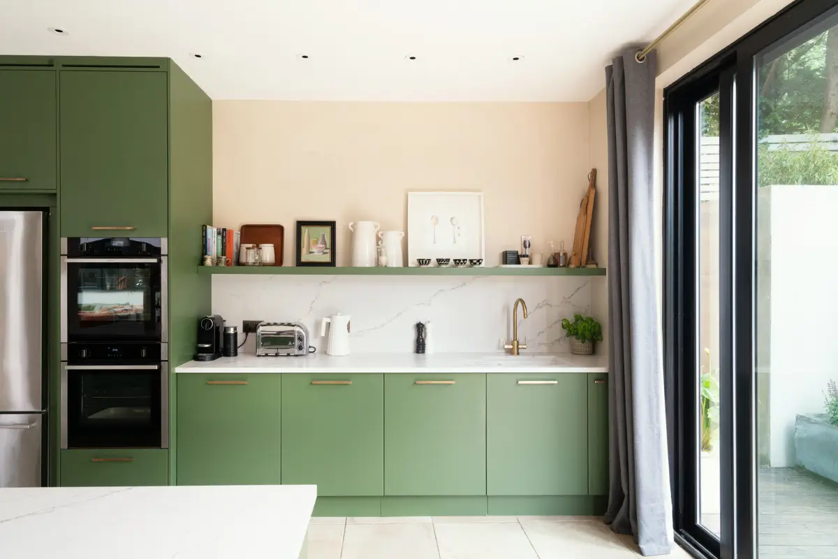 Contemporary Open-Plan Living Spaces in an English Victorian House 9 green kitchen cabinets brass fittings