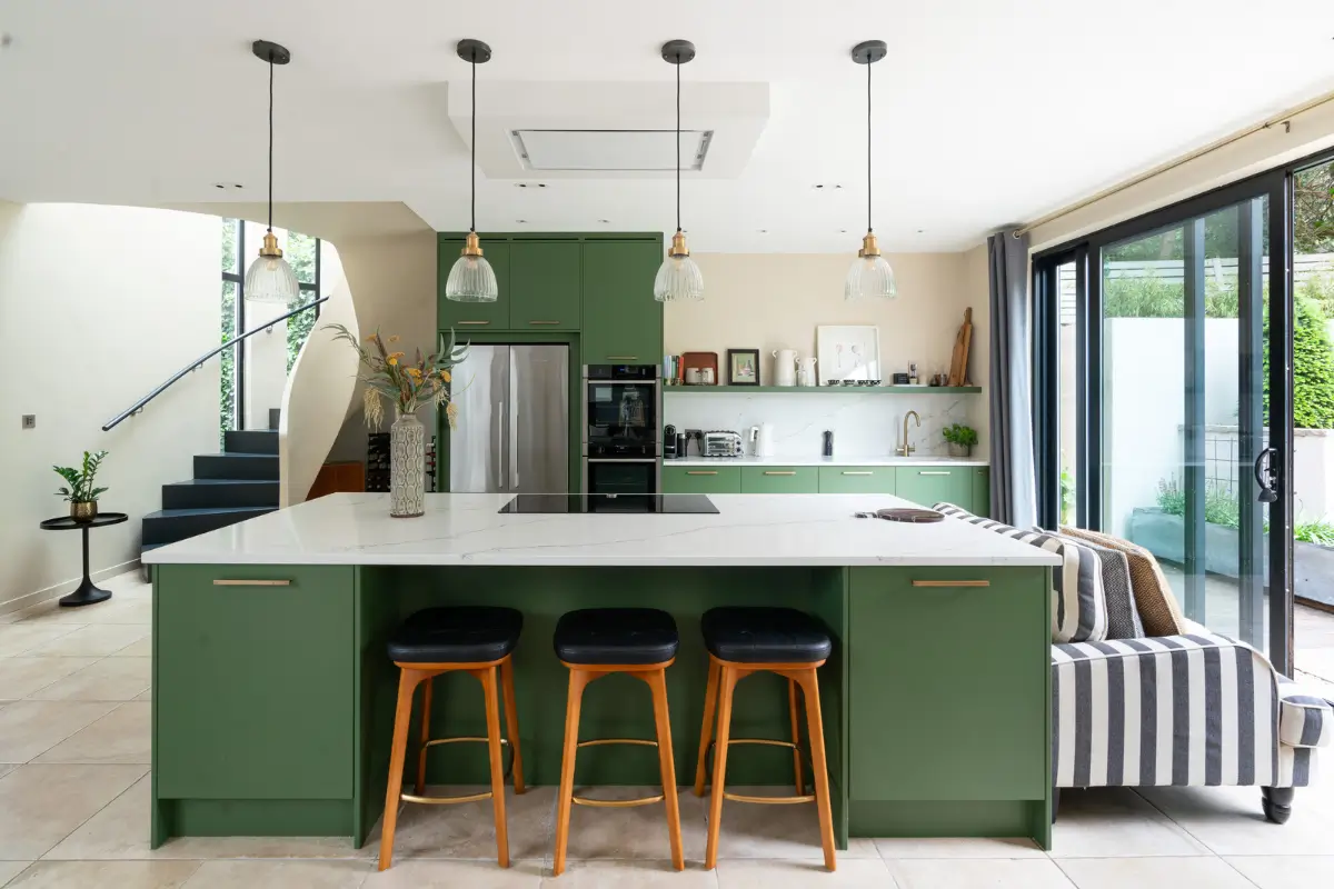 Contemporary Open-Plan Living Spaces in an English Victorian House 8 green kitchen with island