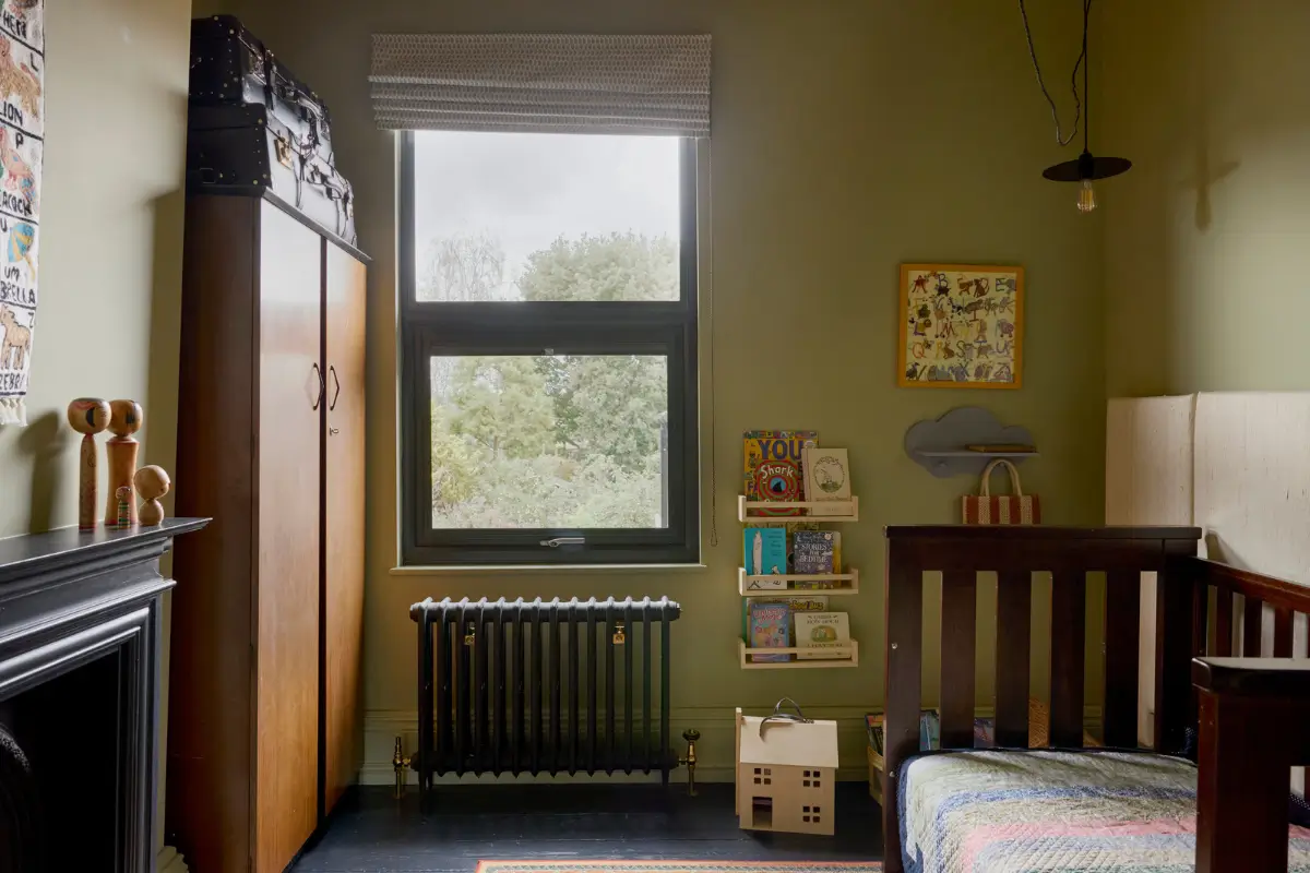 A Victorian Home with a Rich Color Palette and a Lush Garden 18 green nursery