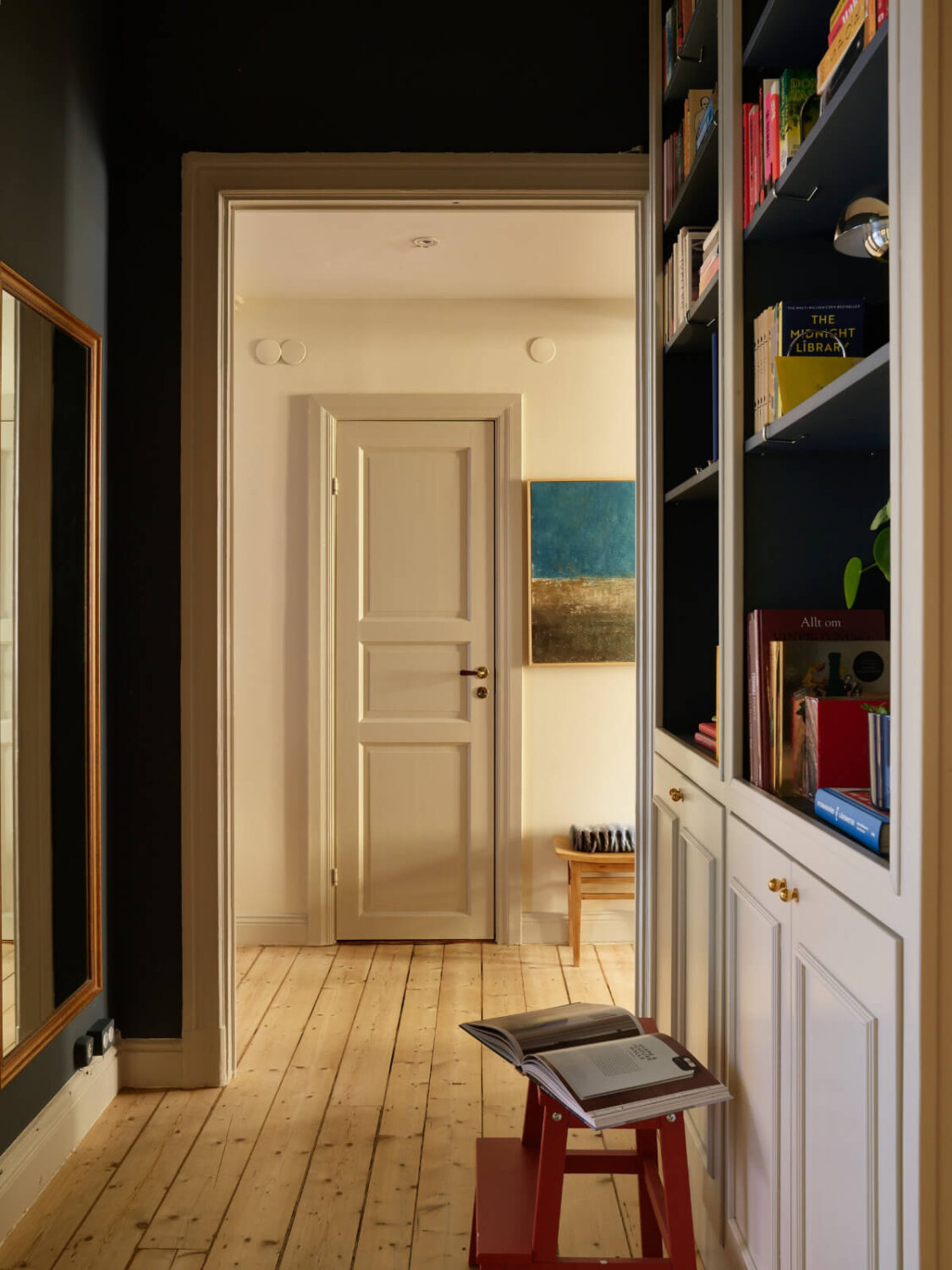 Blue and Red Color Accents in a Stylish Scandinavian Apartment 23 hall built-in cabinets