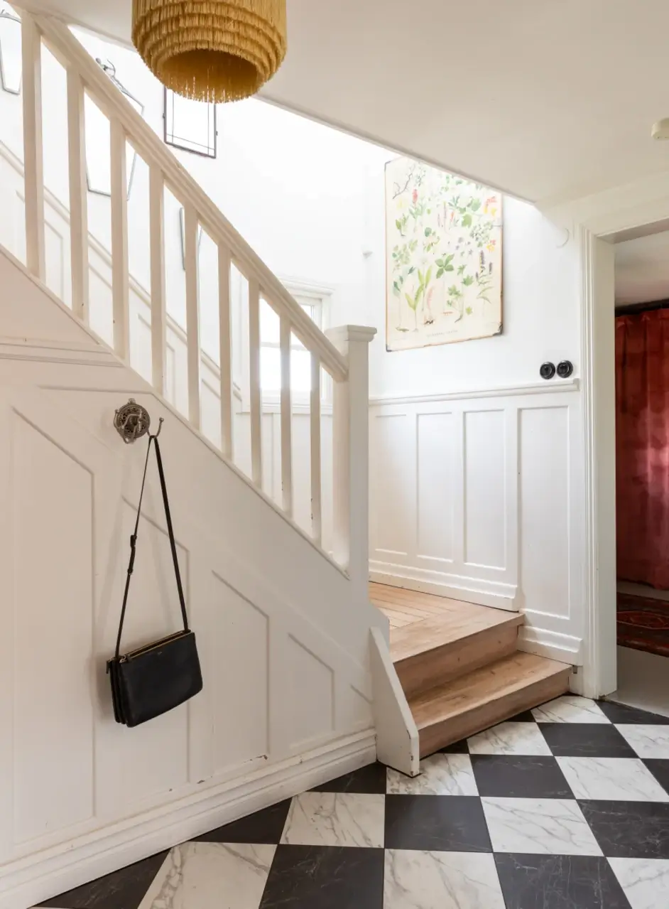 A Renovated 1920s Villa with a Spectacular Garden 22 hall checkerboard floor