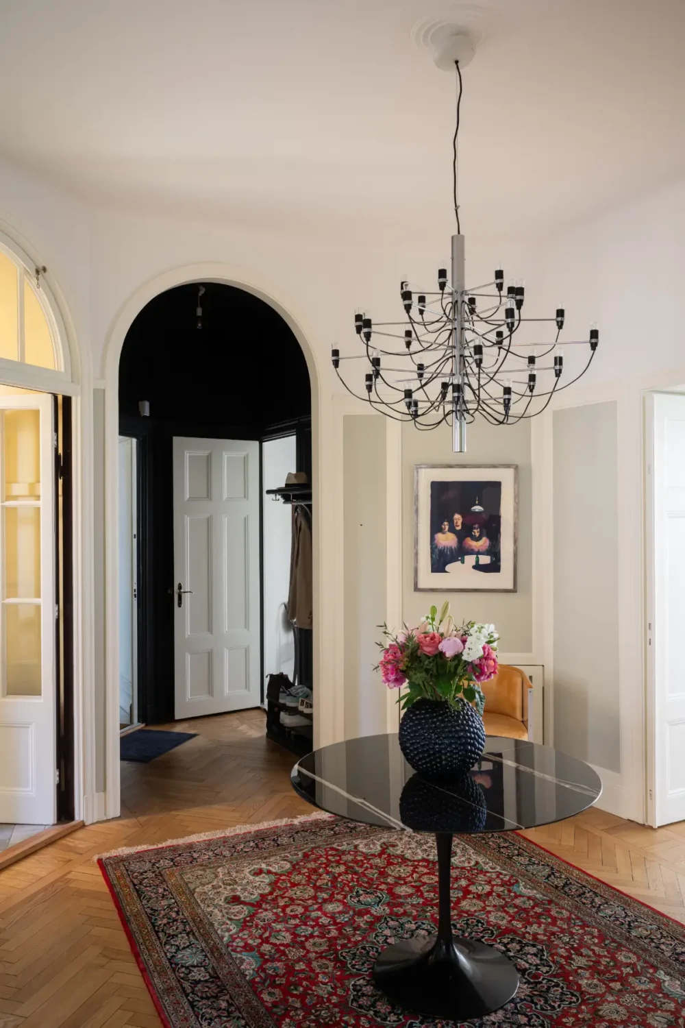 A Classic Stockholm Apartment with a Sky-Blue Kitchen 17 hall herringbone parquet floor