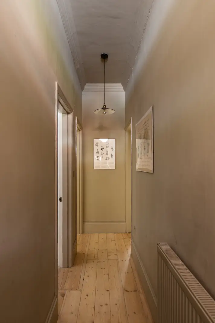 A Modern Extension and Period Details in a Ground Floor London Home 18 hall wooden floor