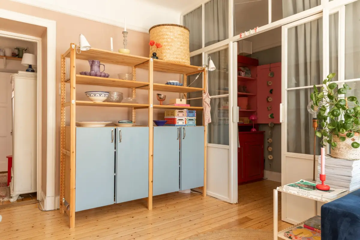 A Cozy Colorful Family Apartment with an Industrial Room Divider 9 ikea ivar cabinets blue doors