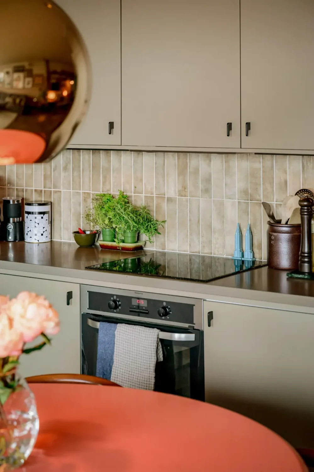 A Modern Swedish Apartment with Half-Painted Pink Walls 12 kitchen backsplash detail