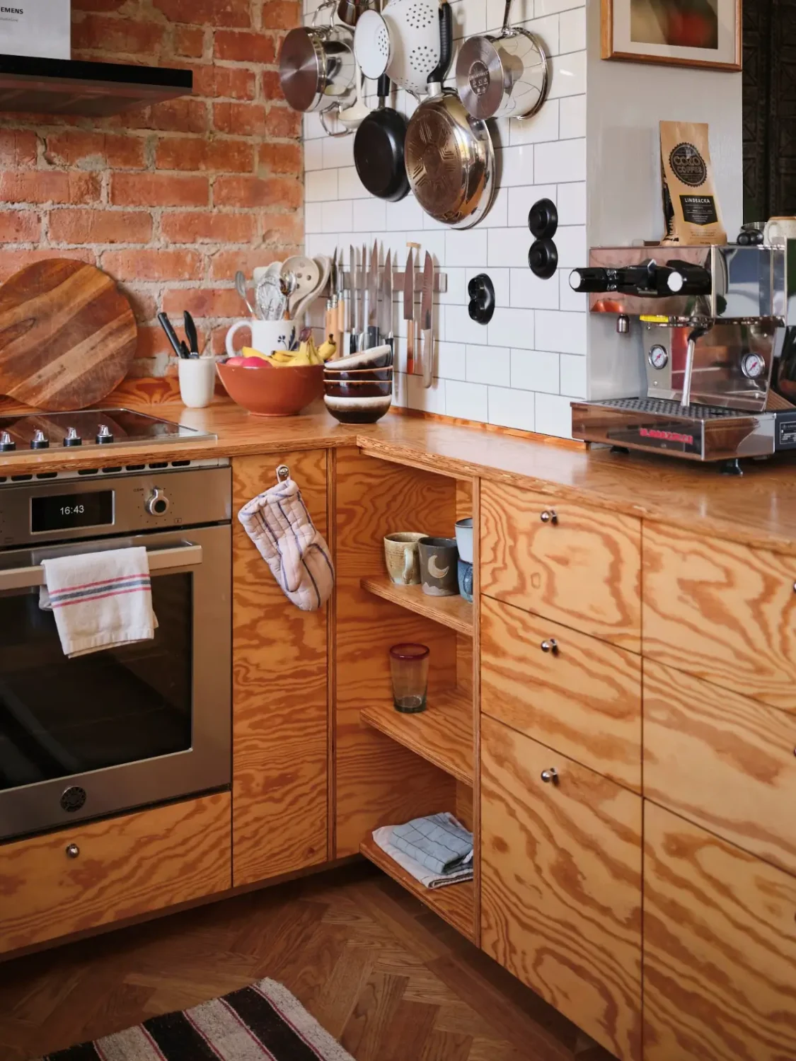 A Pink Bathroom and a Plywood Kitchen in a Stockholm Apartment 5 kitchen cabinets