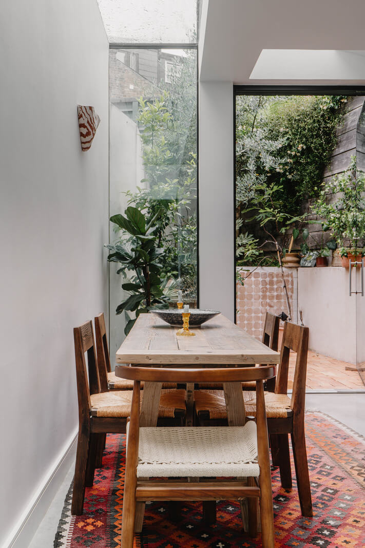 A Modern Ground-Floor Apartment with a Tiny Patio Garden 5 kitchen dining table