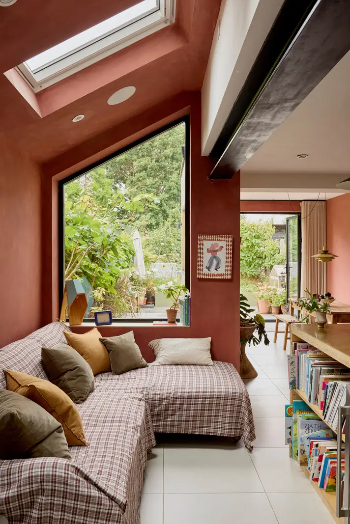 A Victorian Home with a Rich Color Palette and a Lush Garden 6 kitchen extension lounge sofa