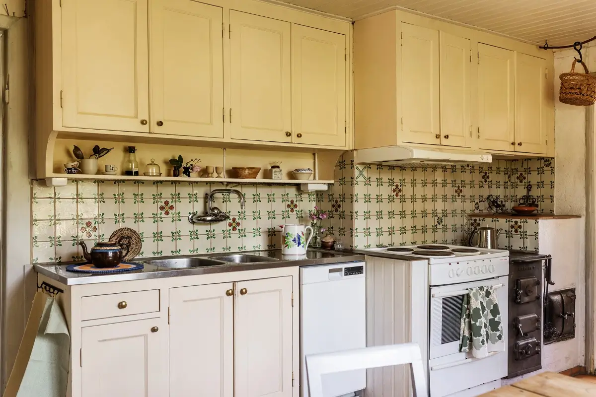 A Historic Lakeside Summer House in the Stockholm Archipelago 12 kitchen green backsplash tiles