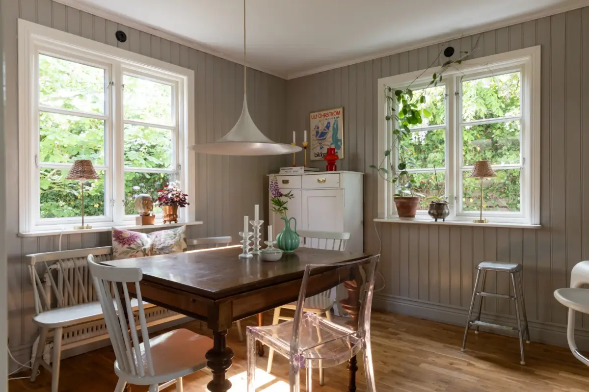 A Renovated 1920s Villa with a Spectacular Garden 8 kitchen table tongue and groove paneling